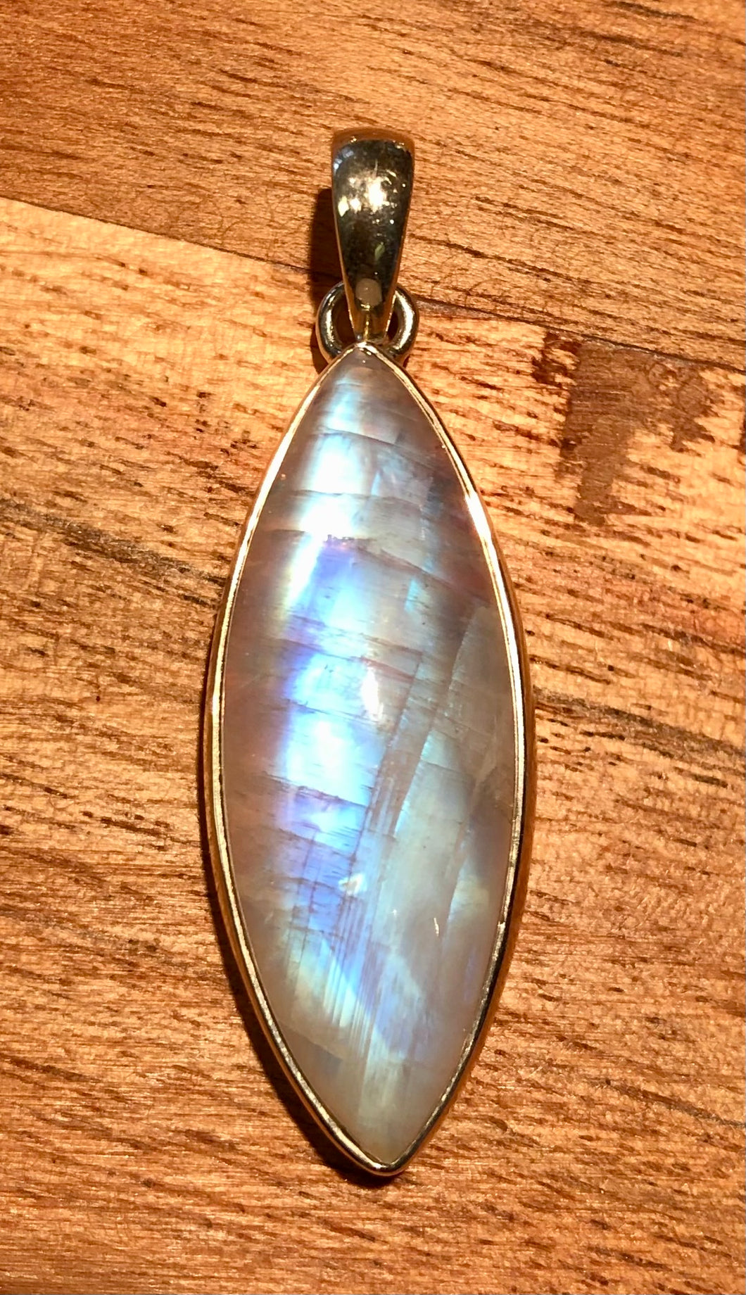 Elongated Pointed Oval Rainbow Moonstone Pendant With Sterling Silver